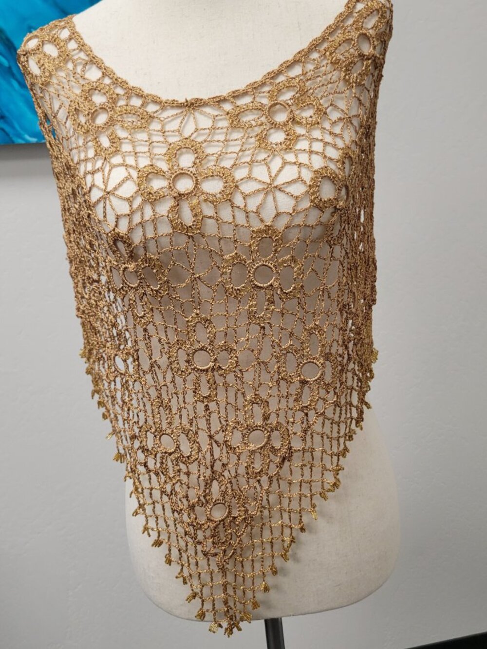 Gold crocheted poncho